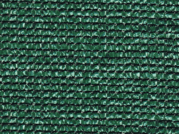 A piece of green heavy duty 300gsm knitted windbreak netting 65% wind reduction, 75% shading